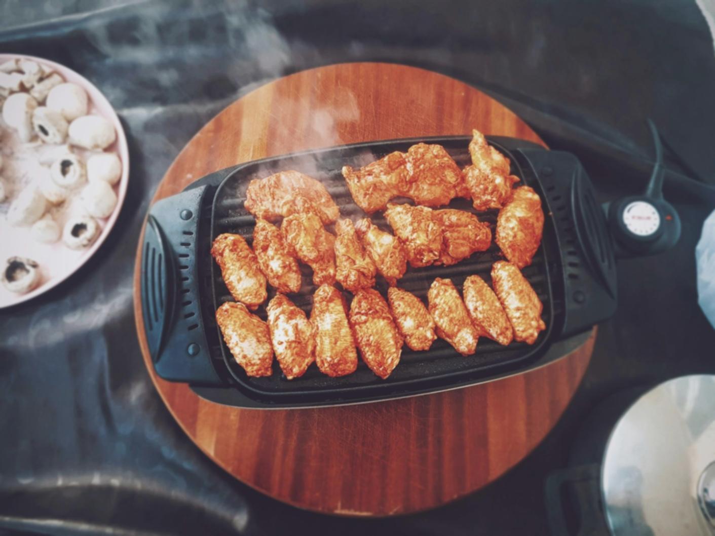 Fresh ingredients organized for meal prep session with colorful vegetables and storage containers